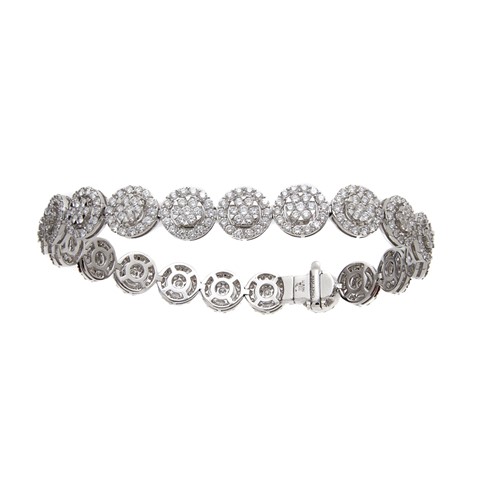 Sold at Auction: LOUIS VUITTON, A MONOGRAM BRACELET in 18ct white